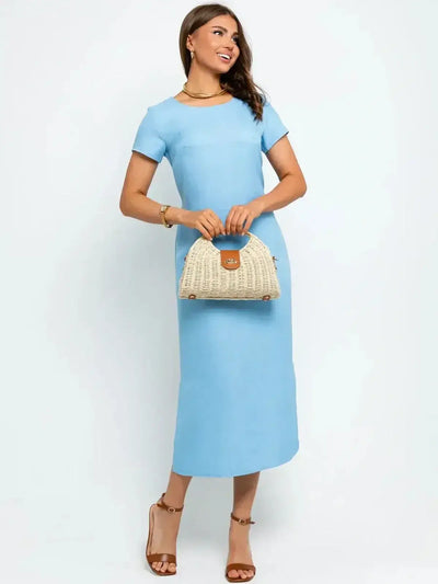 Model wearing the Azure Poise Midi Dress in sky blue, perfect for summer occasions and casual outings.